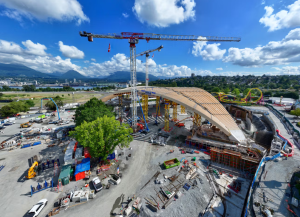 Final beam lifted into place on Freedom Mobile Arch, one of world’s largest mass timber structures